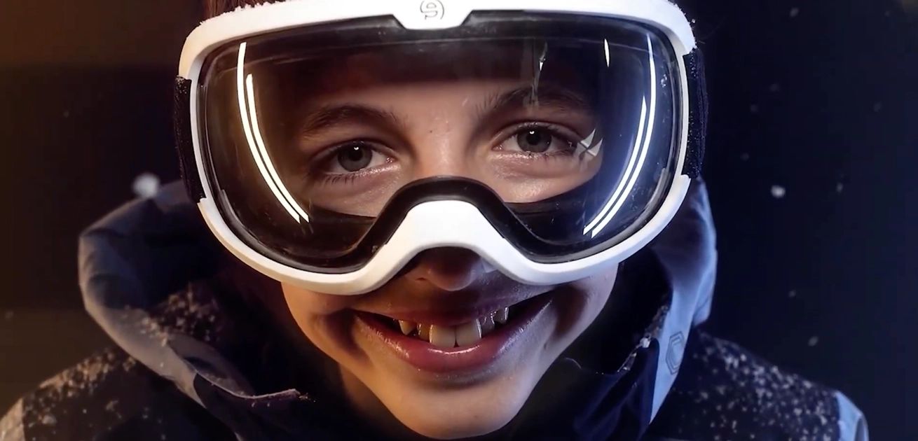 a smile from a young rebel skier