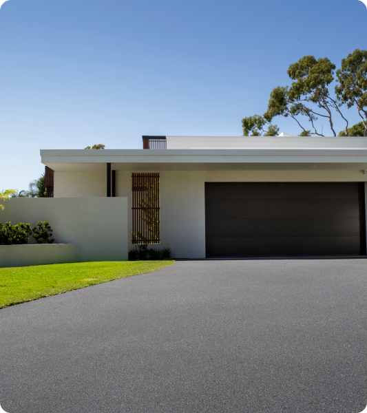 Exterior home featuring Dulux Avista concrete driveway