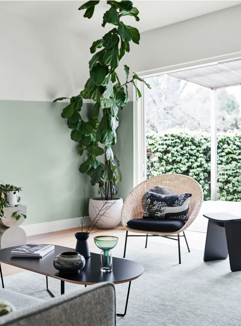 Two-tone white and green living area for 2020 Summer seasonal trends. 