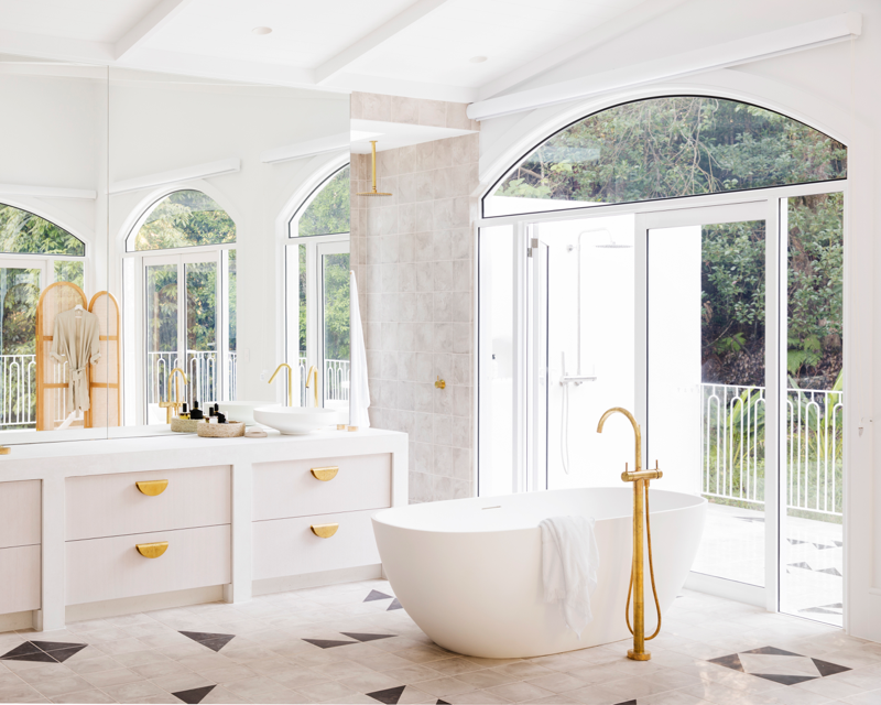 Hinterland Hideaway master bathroom in Dulux White on White with freestanding bath, gold fixtures and vanity to ceiling mirror