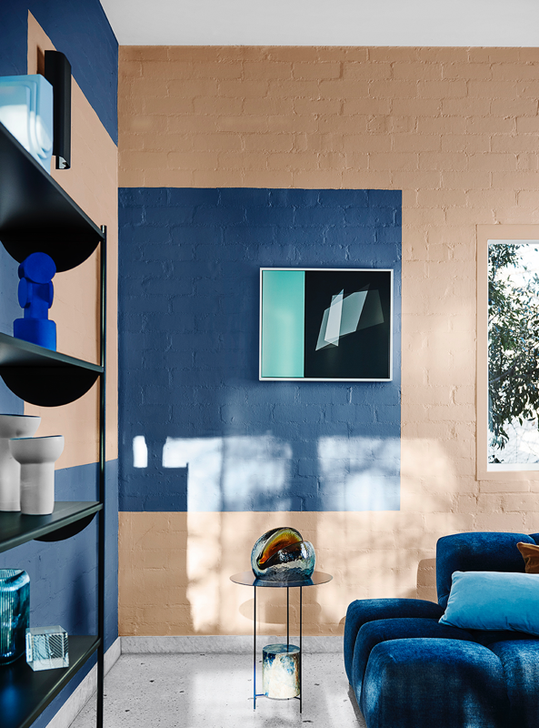 Blue sofa featuring artwork for Dulux Comeback trend as part of the Dulux 2020 Colour Forecast.