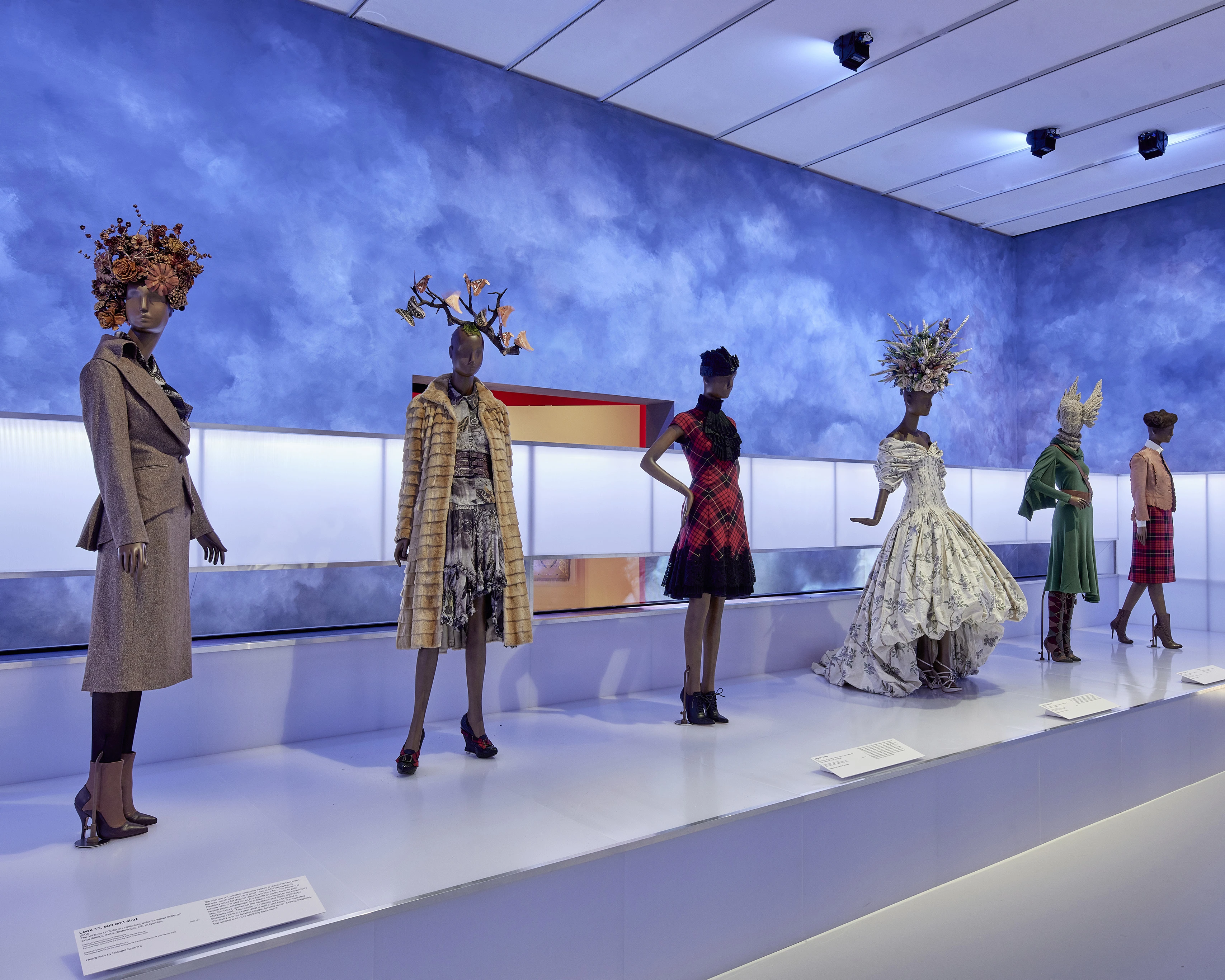 Alexander McQueen Installation at the National Gallery of Victoria with blue, cloudy background