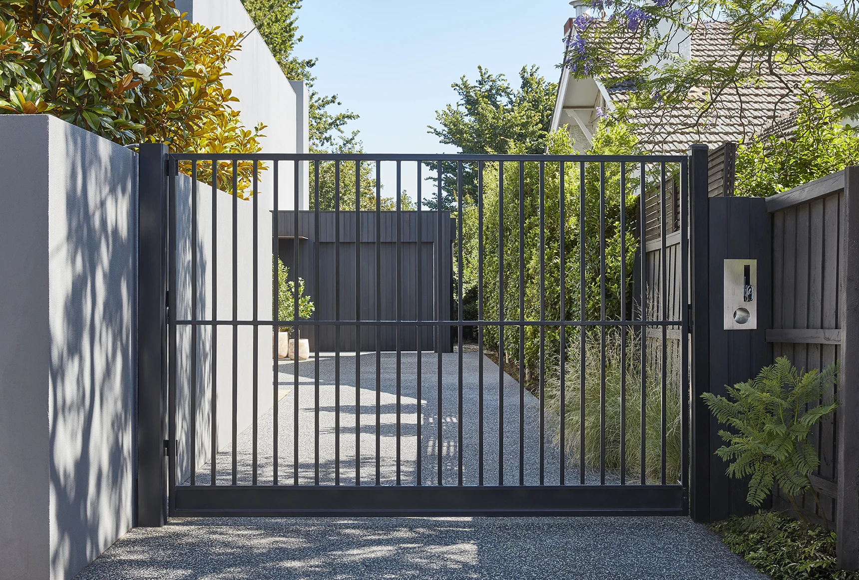 Black iron driveway gate