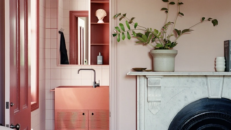 pink bathroom and marble mantle