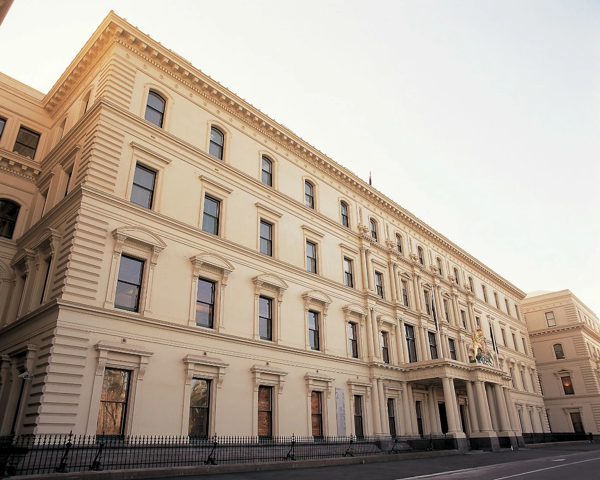 Four-storey cream heritage Commonwealth Government building.