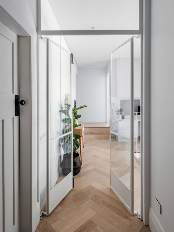 interior white hallway glass doors.