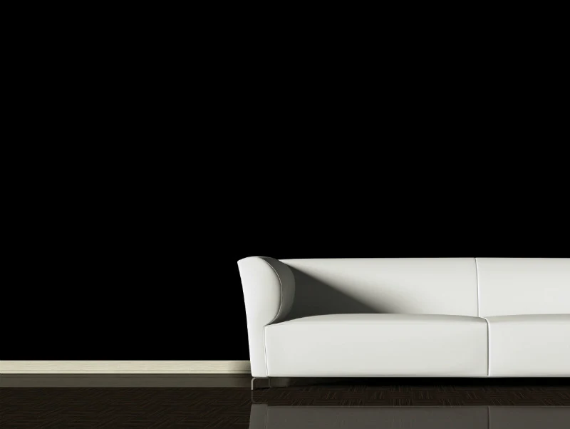 Theatre black wall with white couch