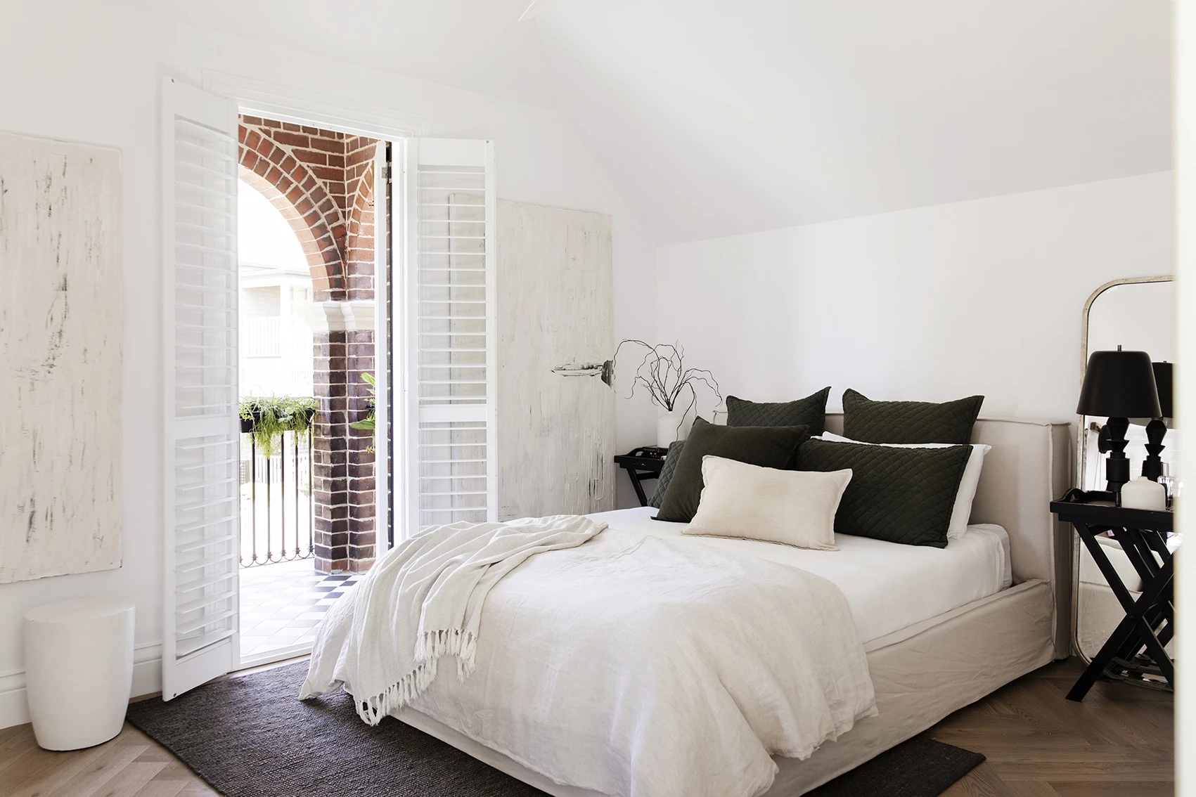 White bedroom with French doors