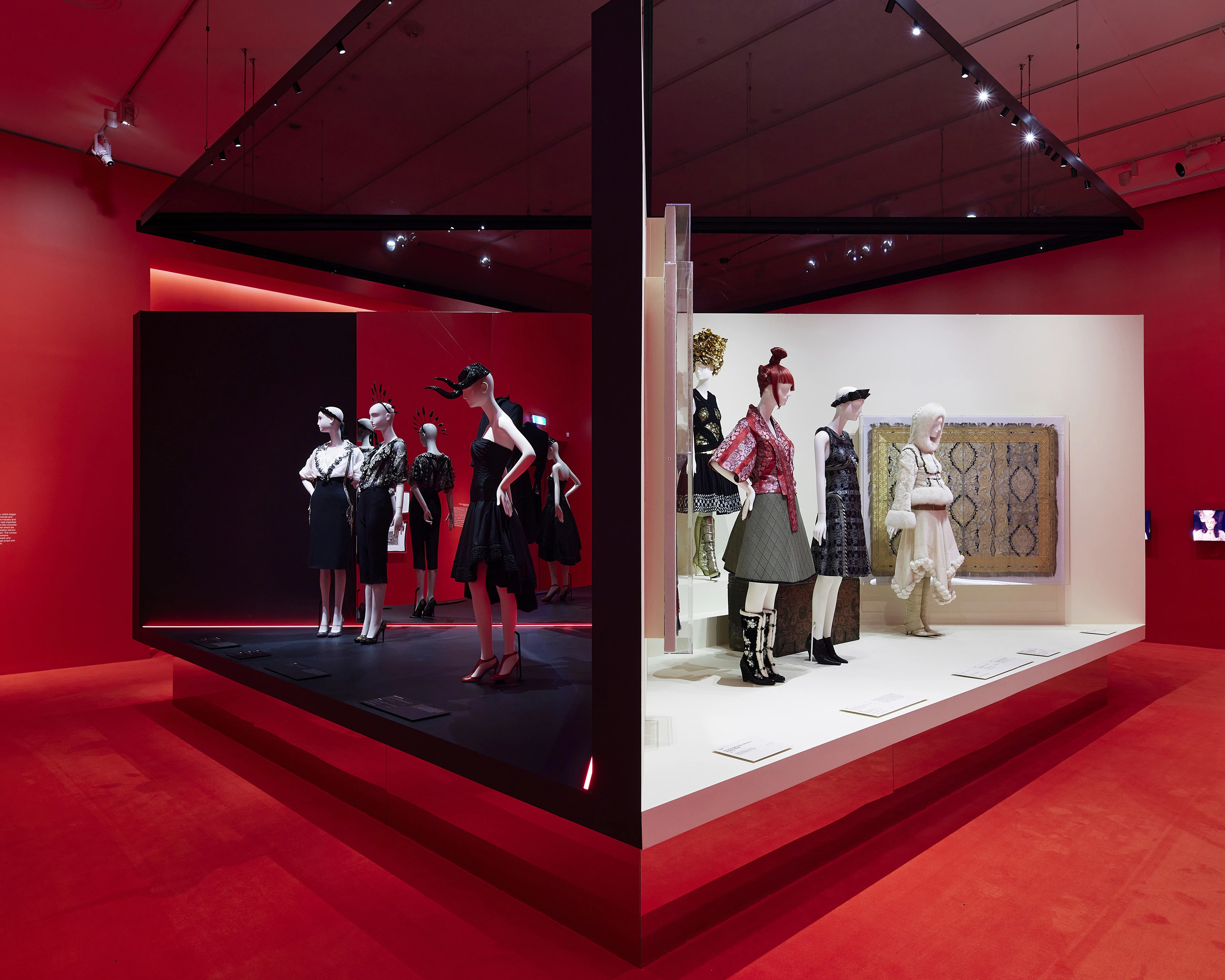 Alexander McQueen Installation at the National Gallery of Victoria with striking red background