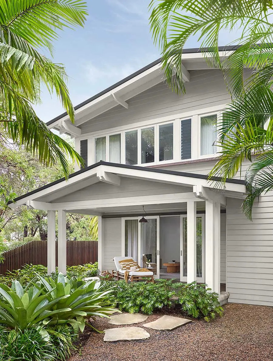 White and grey double-storey weatherboard house