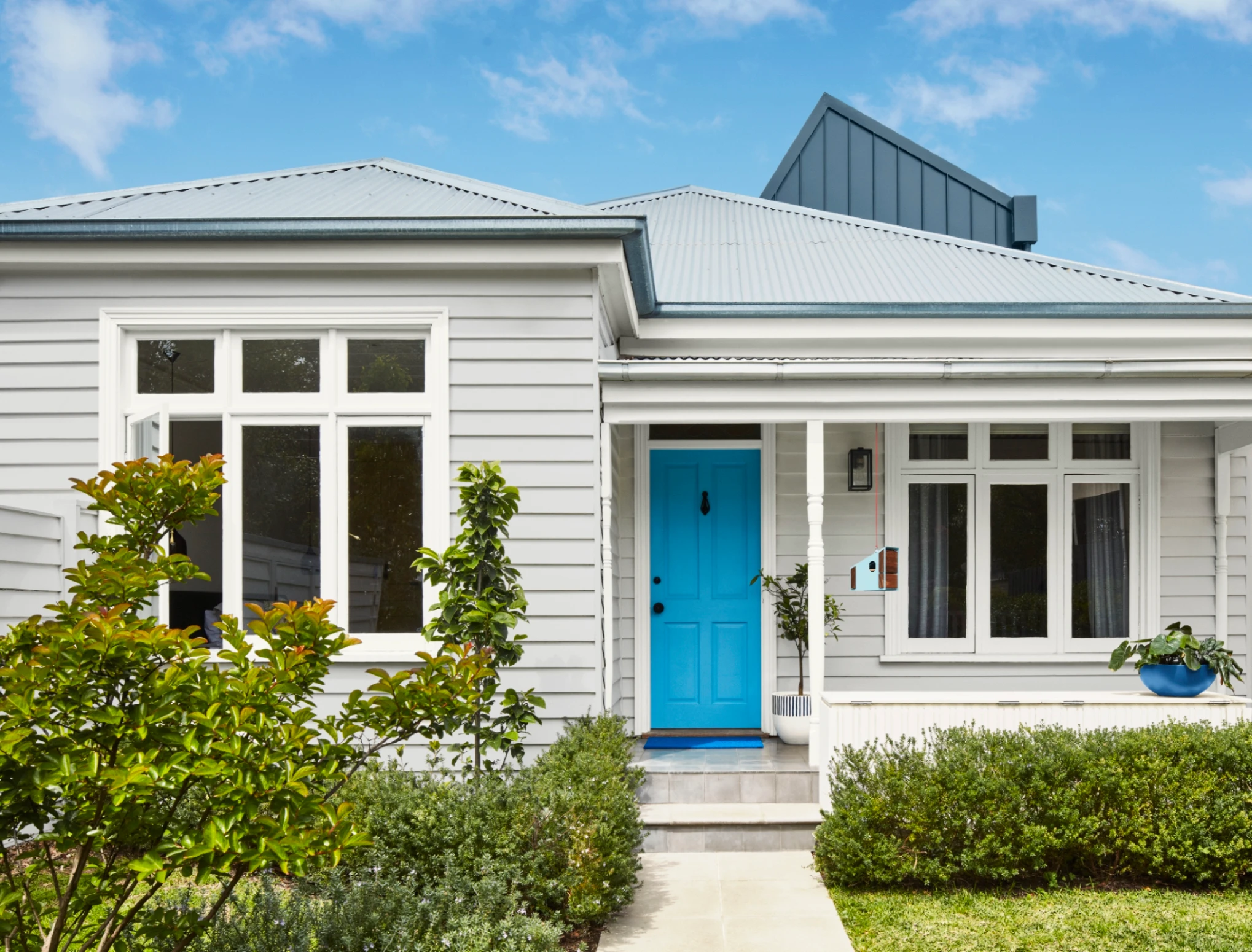 white homes exterior blue door