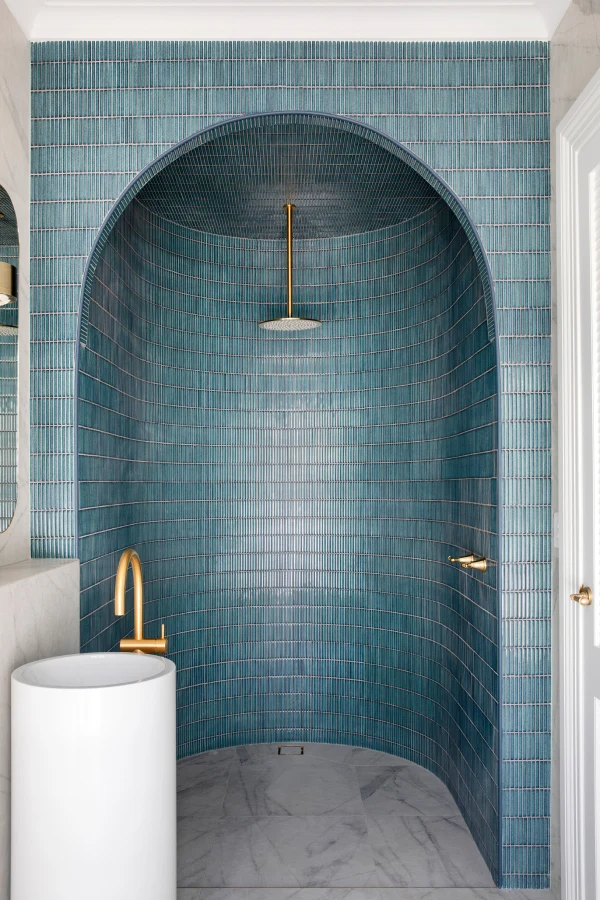 House 13 blue bathroom by Three Birds Renovations.