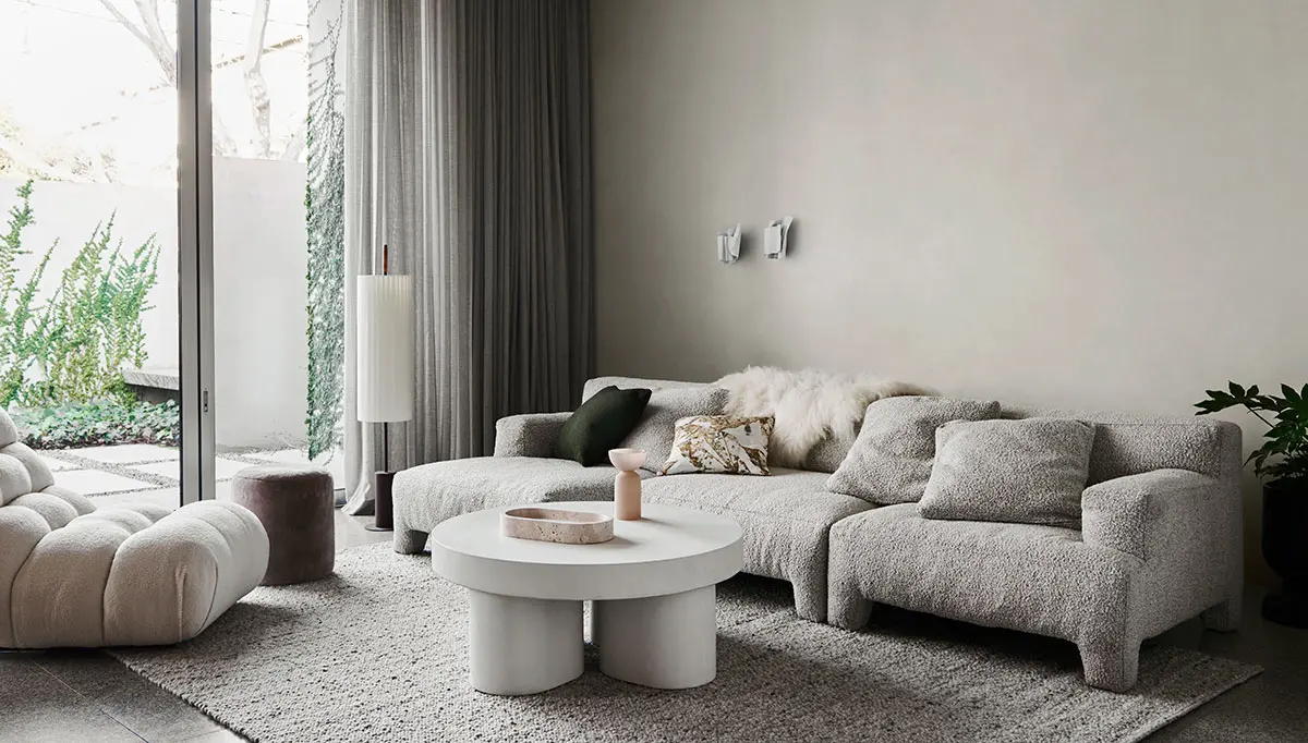 Lounge with neutral colours and grey couches