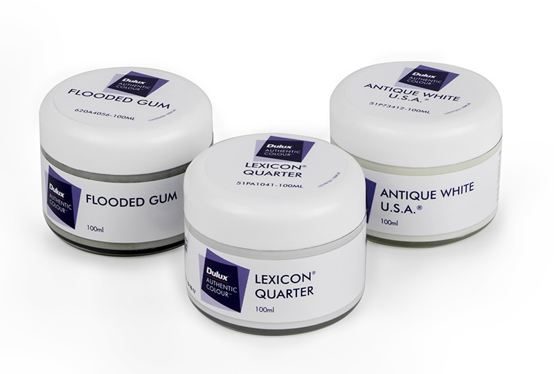 Dulux sample pots in Flooded Gum, Lexicon® Quarter and Antique White U.S.A.®.