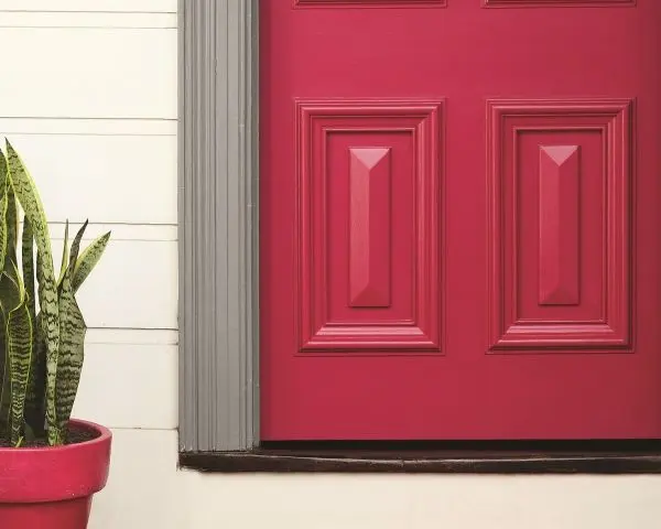 close up exterior of pink door.