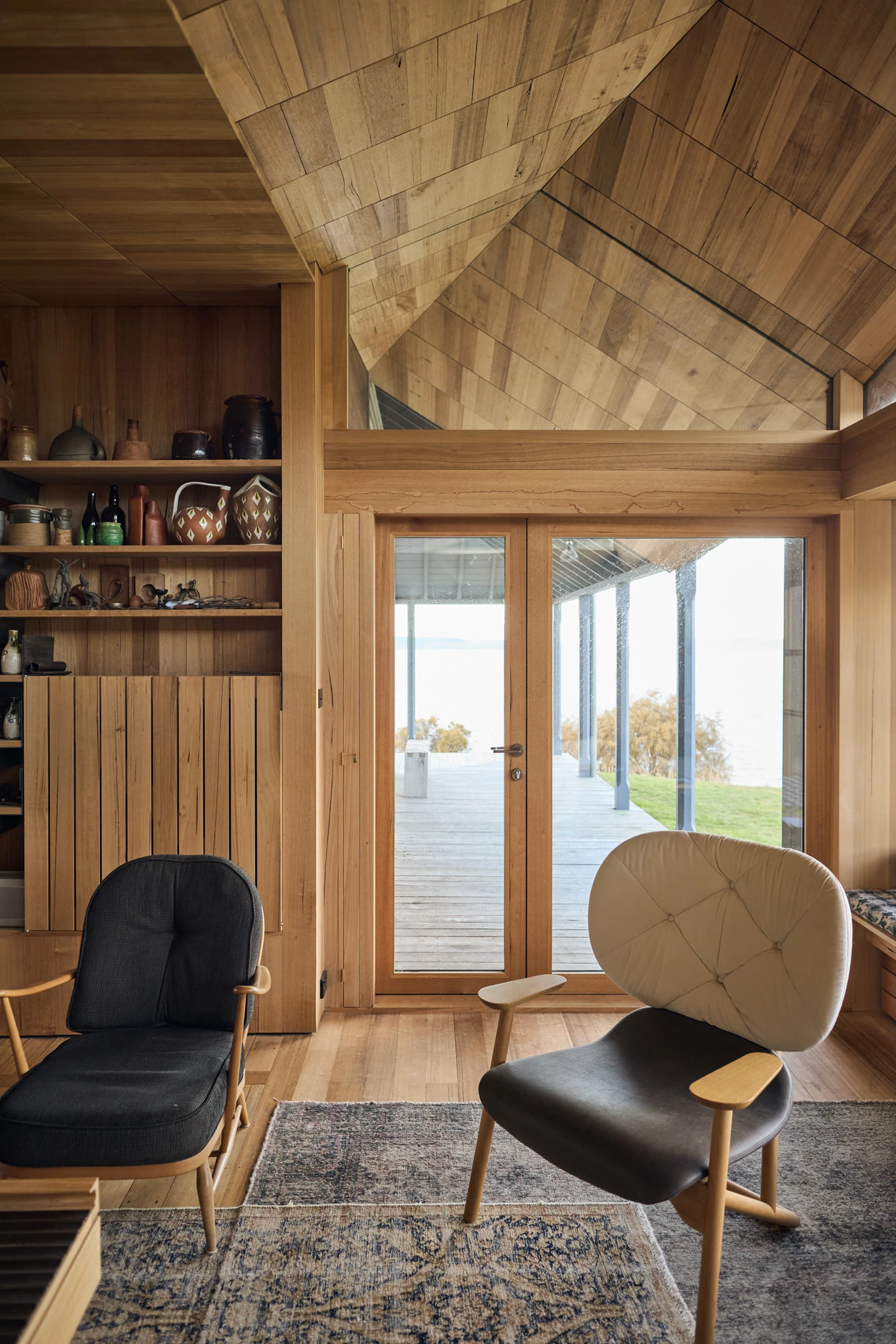 Timber living room with modern armchairs