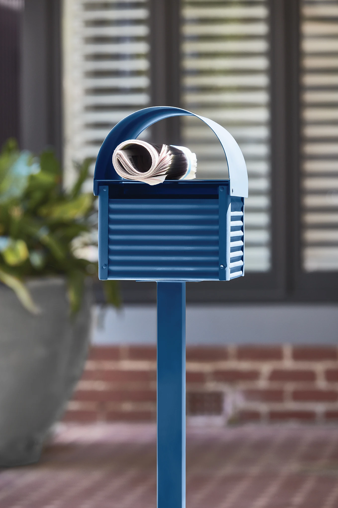Blue metal letterbox