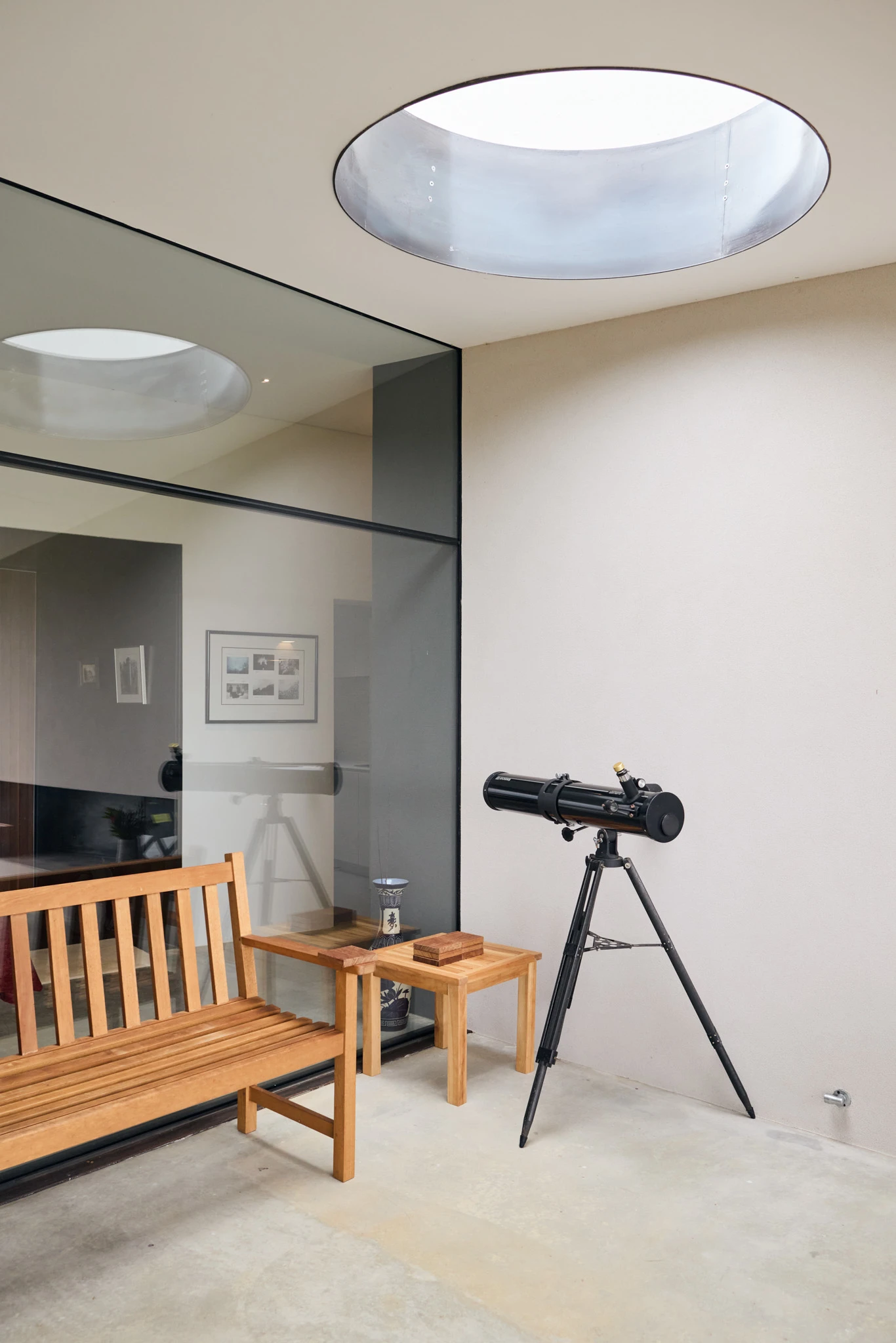 Modern concrete patio with telescope