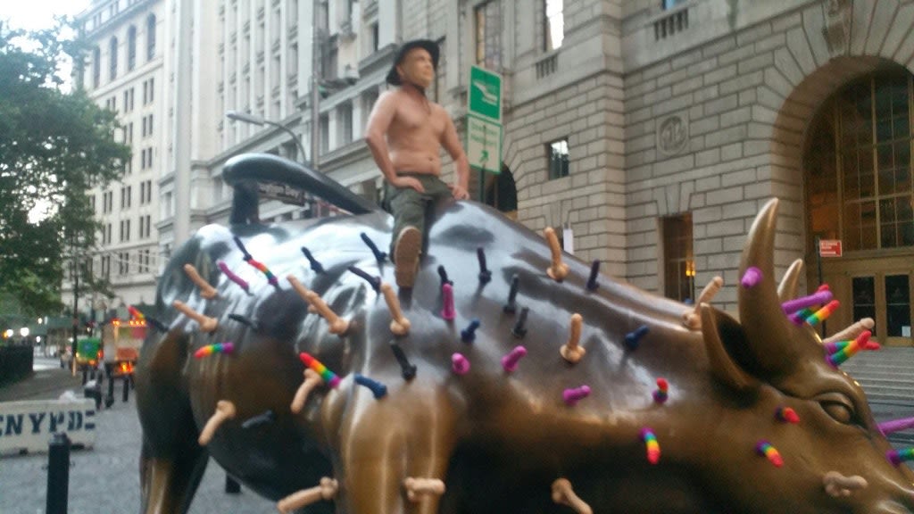 Wall Street Bull Covered in Sex Toys by 'Vladimir Putin'
