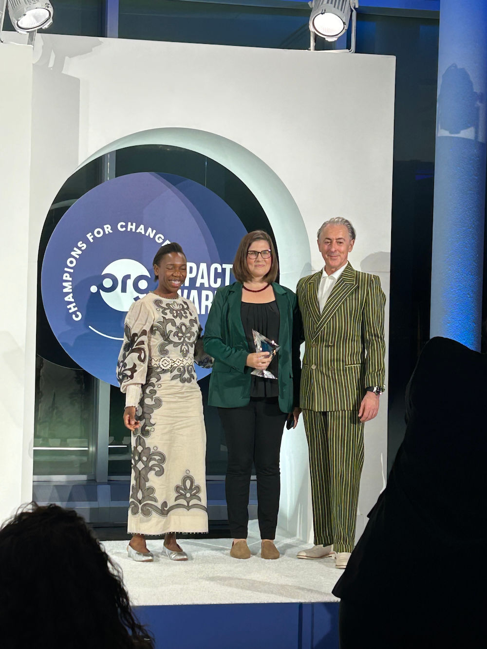 Anna Titulaer (middle), Kiva's Executive Vice President, Partnerships and Communications, accepted the award on behalf of the organization during the ceremony in Washington D.C.