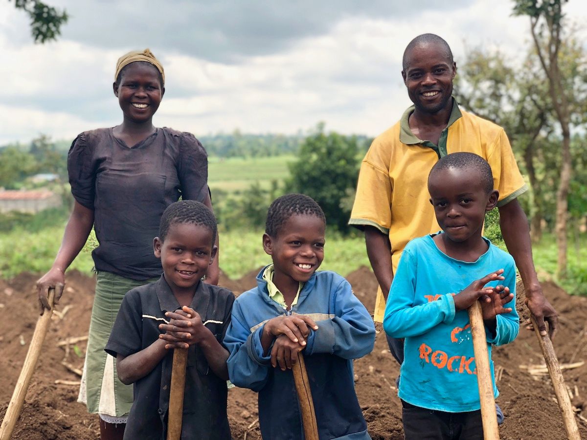 Elizabeth is a farmer and mother of three children in Kenya, who took a Kiva loan to help improve her harvests