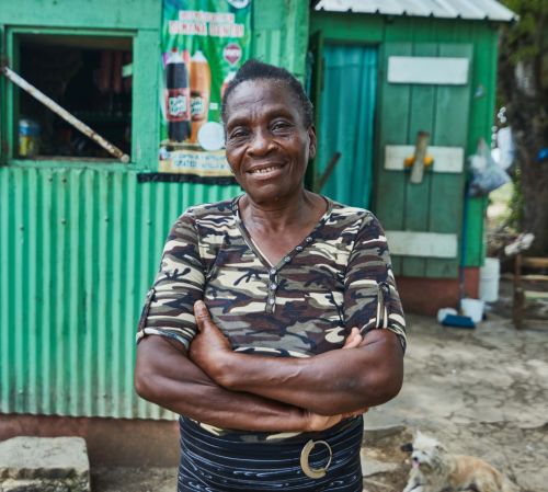 Eufemia is a Haitian refugee who used her loan to help her convenience store business.