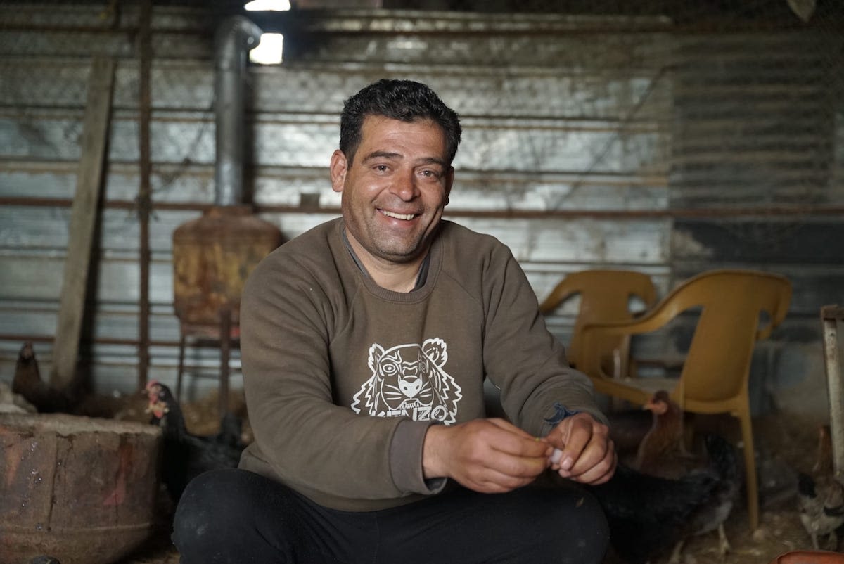 Muhey raises livestock in Palestine. With the help of a loan, he was able to buy, breed and sell more livestock for profit.
