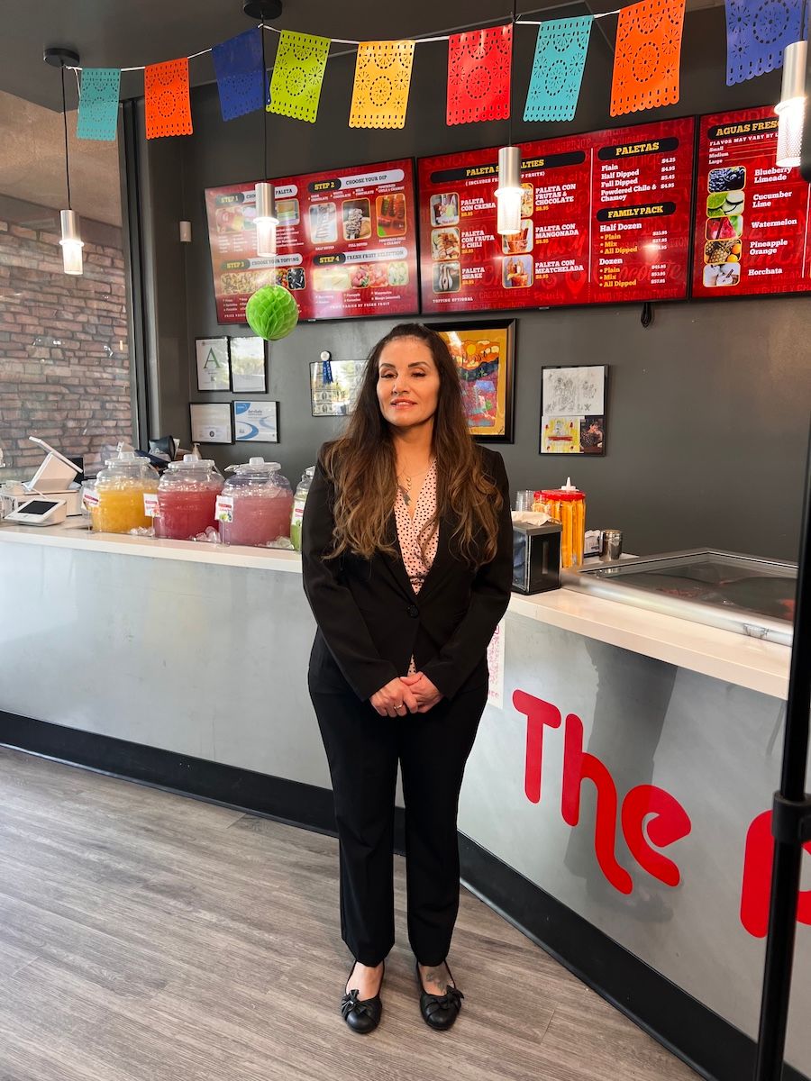 María Elena is the proud owner of Paleta Bar Mesa, a local shop that offers delicious artisanal popsicles.