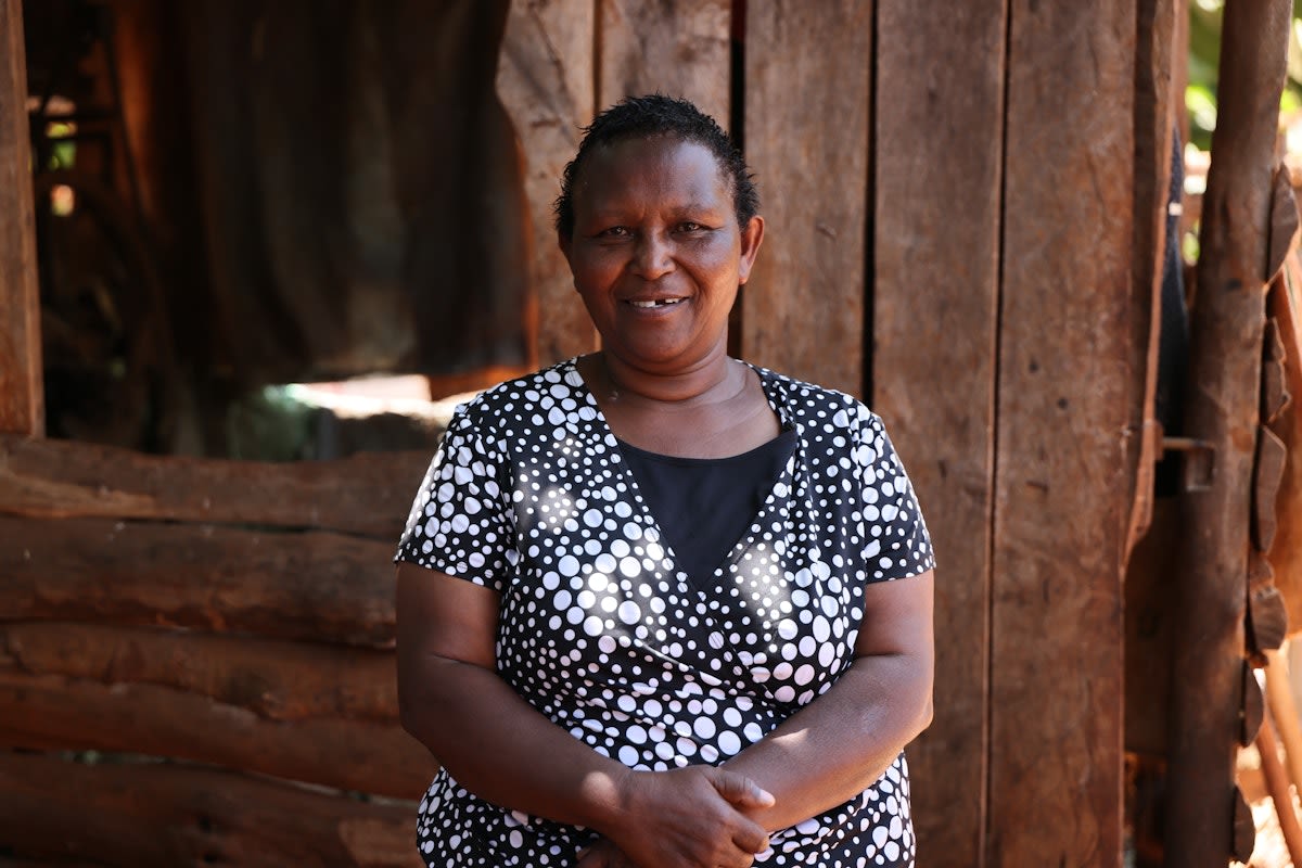 Lucy, a retired teacher and talented farmer, on her farm in Kenya
