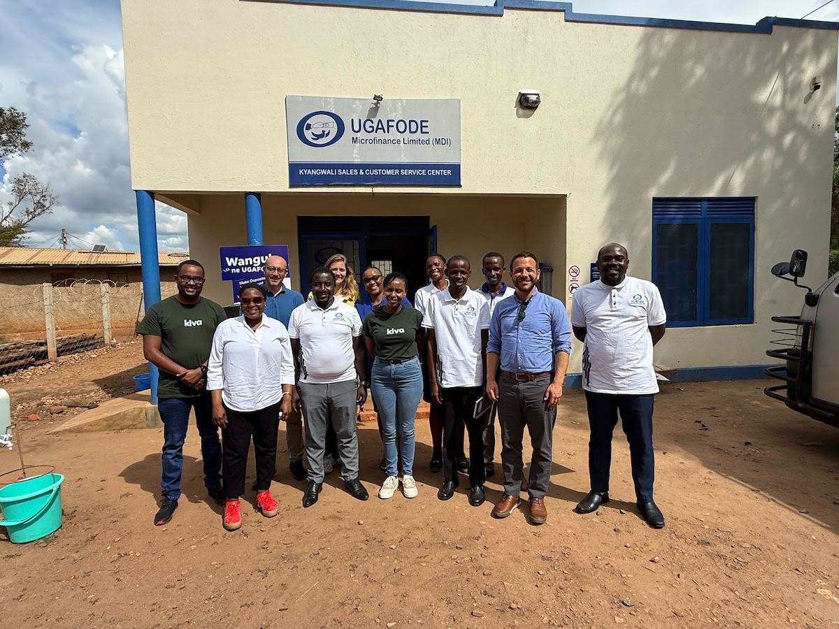 Kiva staff, UGAFODE staff, and FMO staff at the new sales center.