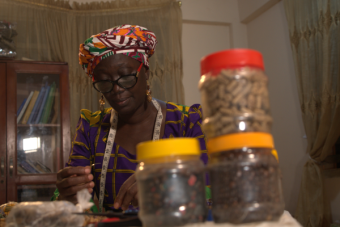 Catherine is a skilled artisan from Ghana. A Kiva loan helped her grow her business and teach the trade to others.