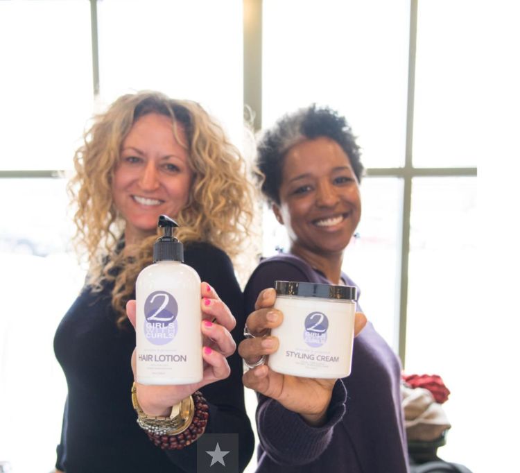 Erin and Leigh-Ann of 2 Girls with Curls show their products