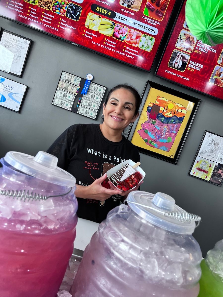María Elena is the proud owner of Paleta Bar Mesa, a local shop that offers delicious artisanal popsicles.