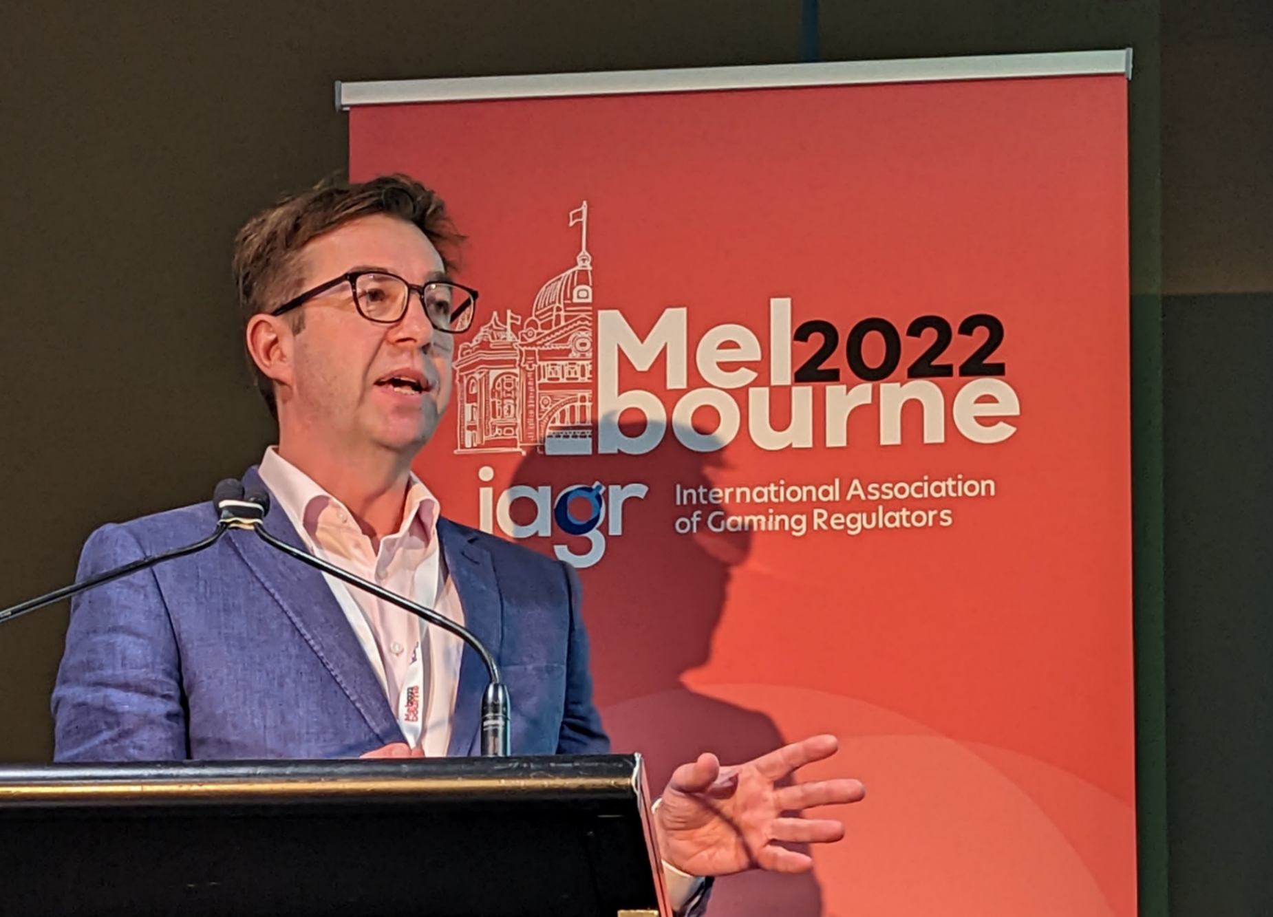 Ben Haden delivering a speech at the IAGR 2022 conference in Melbourne