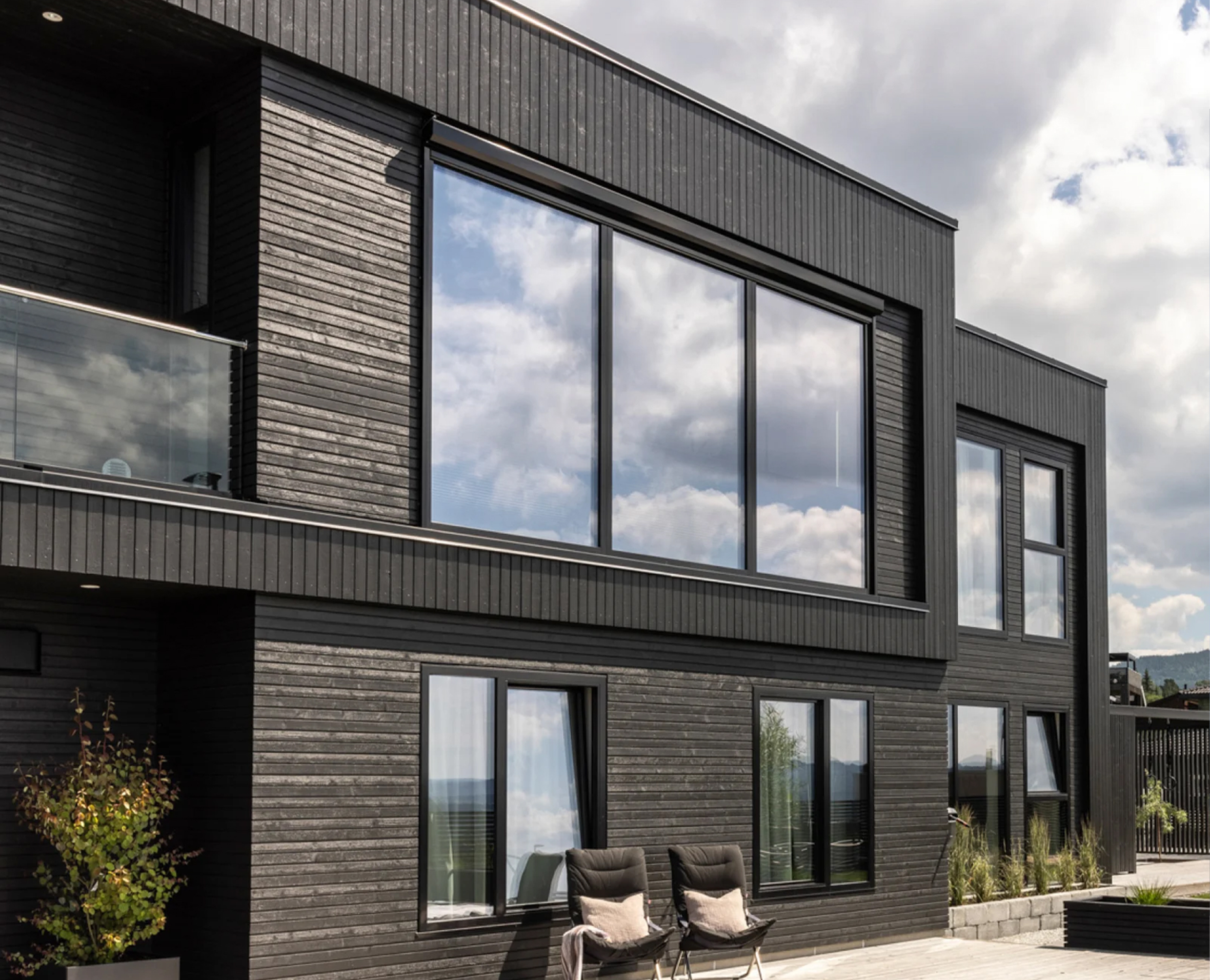 Stående og liggende kledning på samme hus
