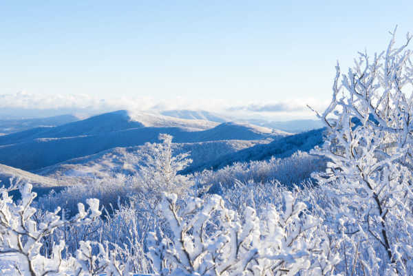 A crisp, clear winter morning reveals Blue Ridge crests caked with fresh snow and rime.