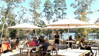 Diners enjoy their meal lakeside at Traditions on the Lake, our on-site restaurant.