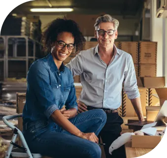 Image of two professional smiling toward the screen