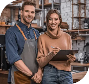 Image of two professional smiling toward the screen