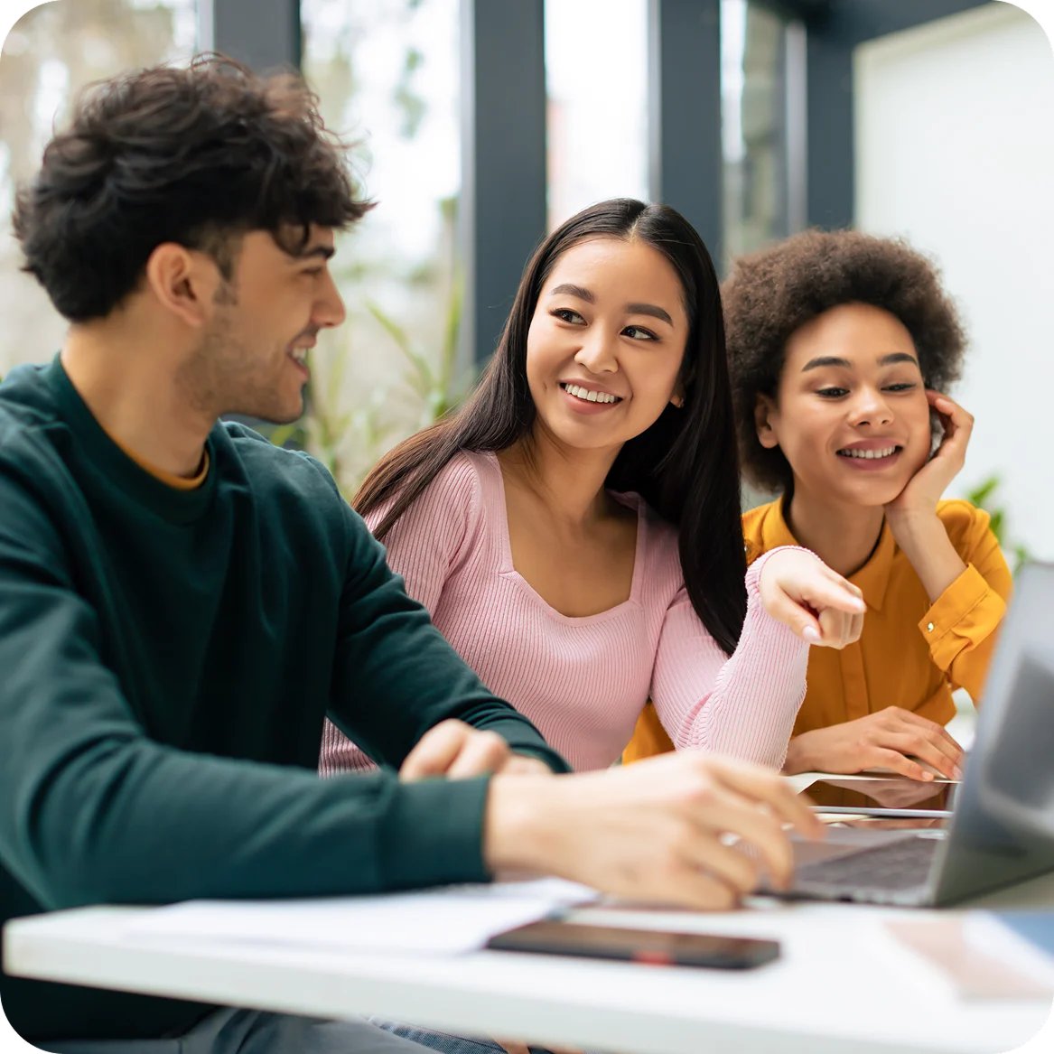 Young group working on laptop