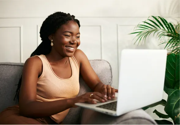 An image of a lady using her laptop.