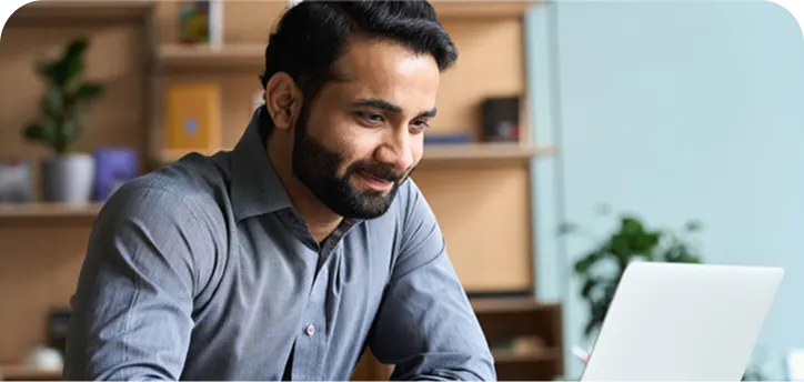 Man wearing boots on top of mountain