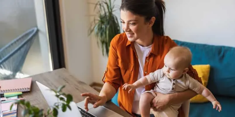 Man wearing boots on top of mountain
