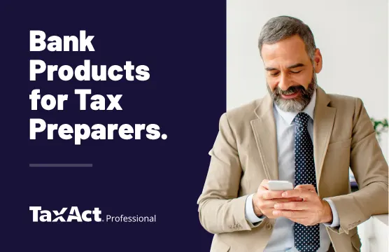 A businessman wearing a suit and tie using his cellphone