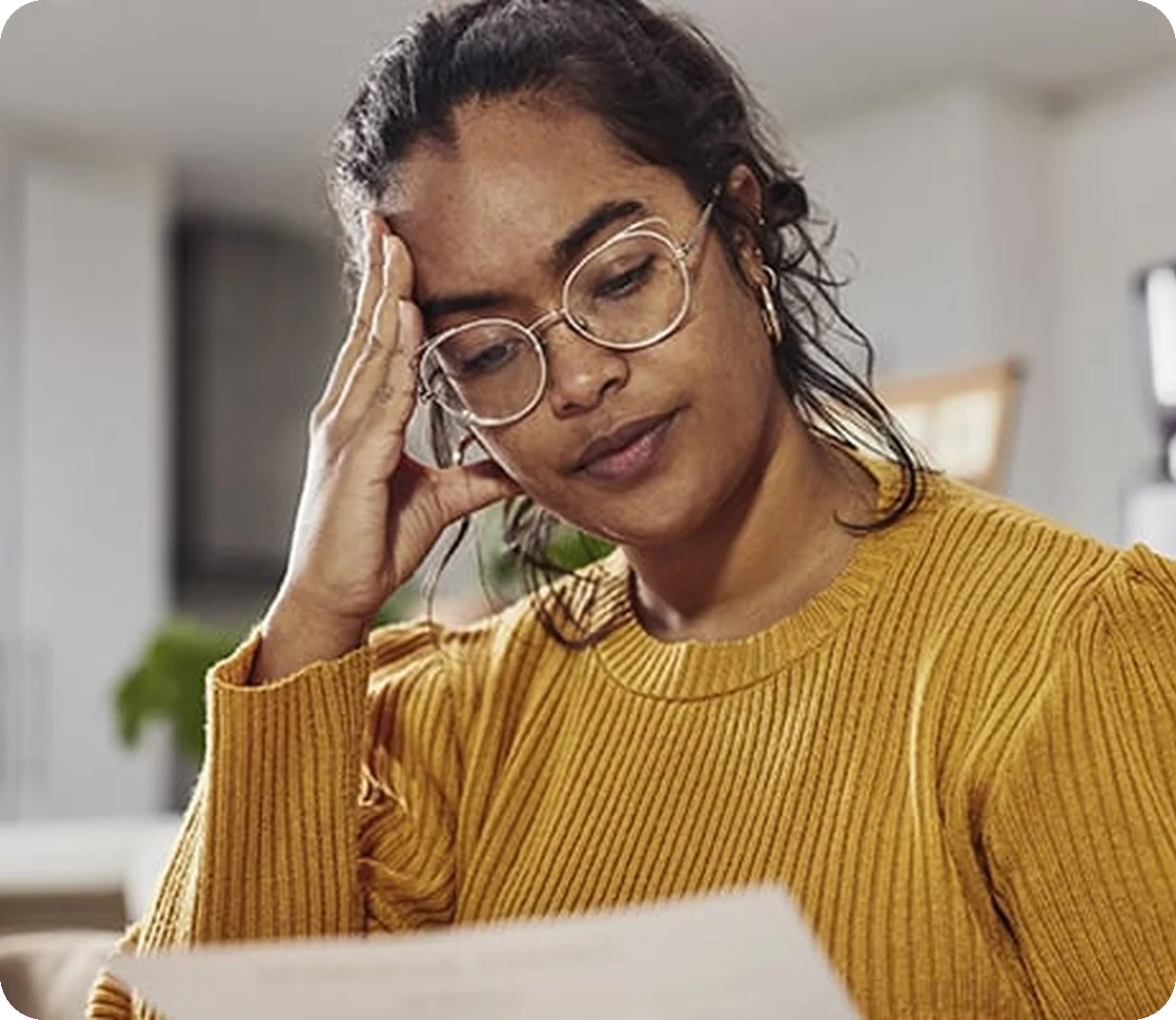 Woman looking at her tax extension documents.