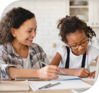 woman and children writing on some papers