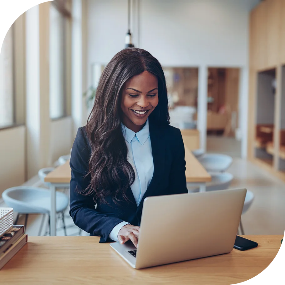 Woman working on laptop audit defense hero