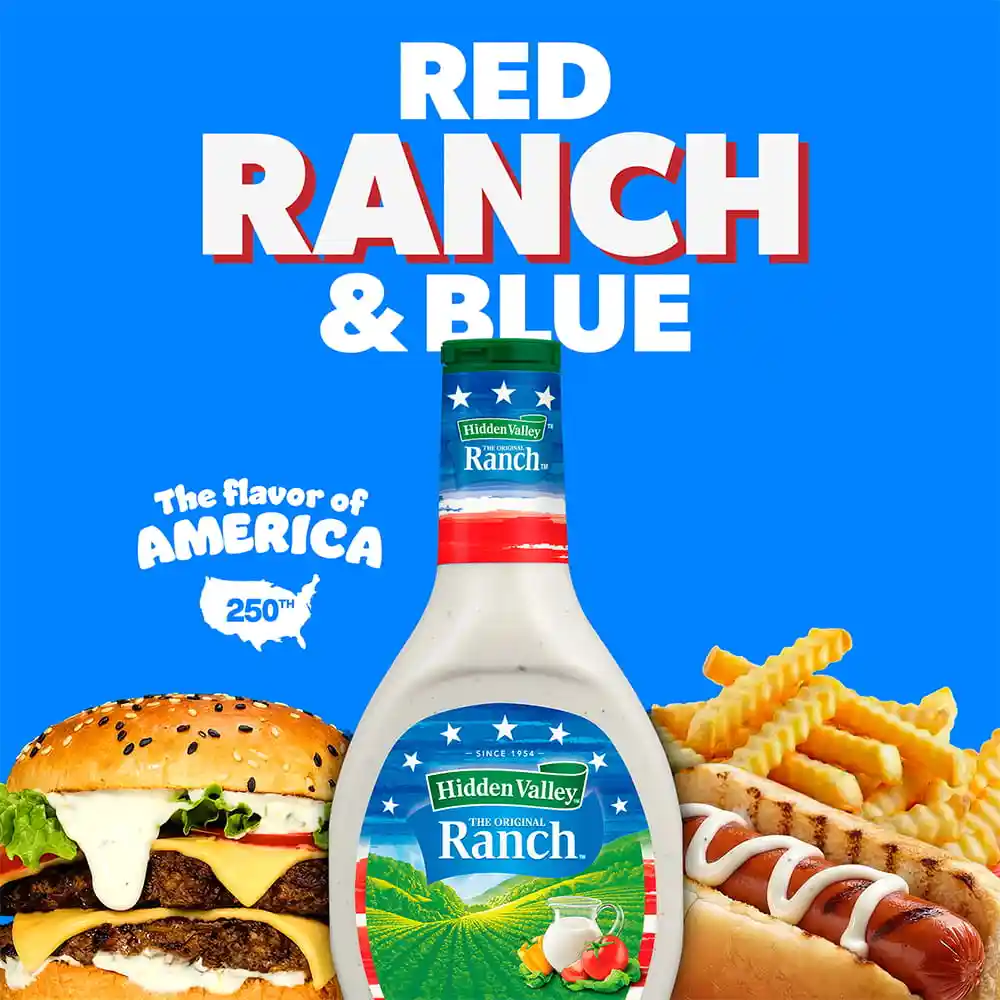 A 16 oz bottle of Original Ranch dressing with America 250 label. A hamburger, fries and hot dog behind on a blue background with the words Red Ranch & Blue