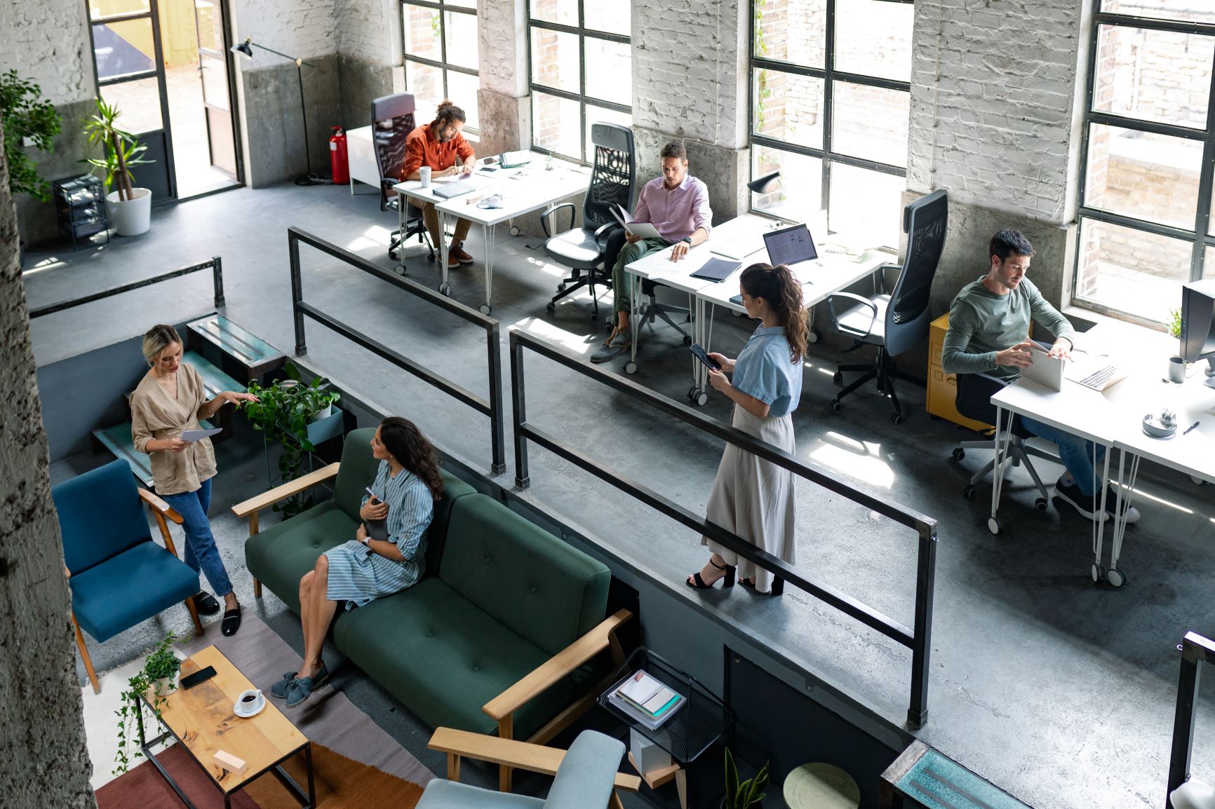 Employees collaborating in coworking space