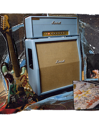 Billie Joe Armstrong's customized blue electric guitar leans against the blue Marshall 1959BJA Artist Signature amplifier.